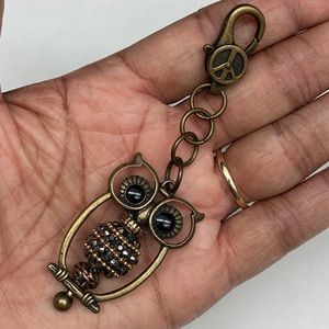 Antiqued Gold Owl Keychain with Peace Sign Detail